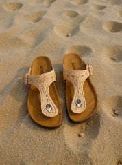 Momoc Altea natural raffia thong sandal on the sand top view cork platform recycled EVA Spain | Momoc Shoes Spain