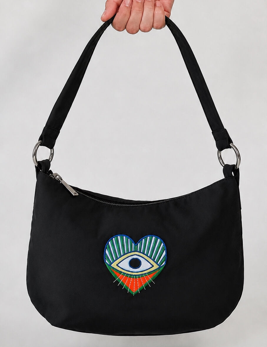 Momoc A Glance Hobo black handbag front view sacred heart eye embroidery handmade Spain | Momoc Shoes