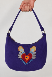 Momoc Te Recuerdo Hobo violet ultrasuede handbag front view sacred heart embroidery wings eye handmade Spain | Momoc Shoes