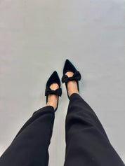 Momoc green velvet ballet flats worn top view dark trousers black bow detail | Momoc Shoes