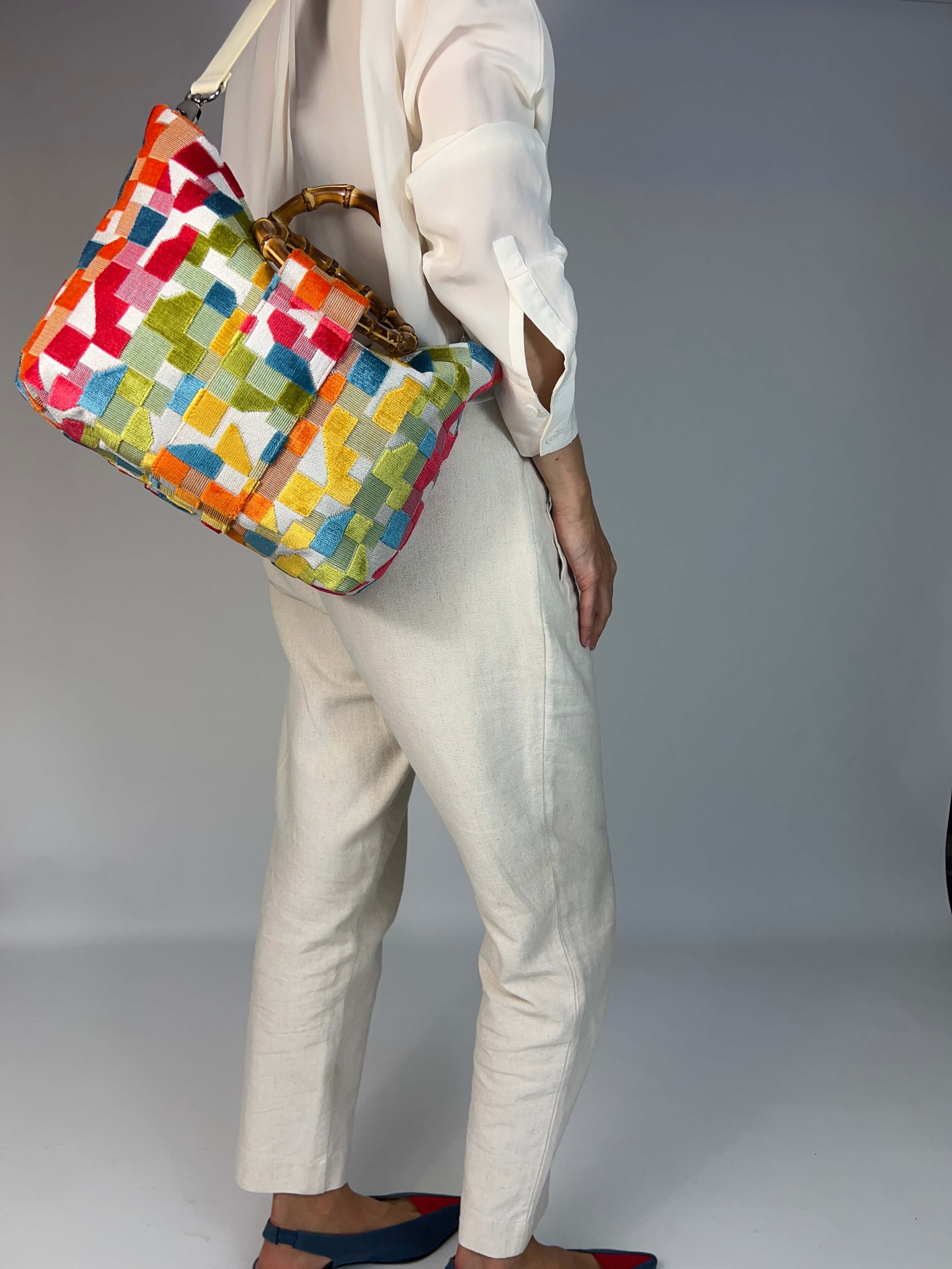 Momoc Frigiliana Mosaic Bamboo bag worn shoulder strap white trousers side view handmade | Momoc Shoes Spain
