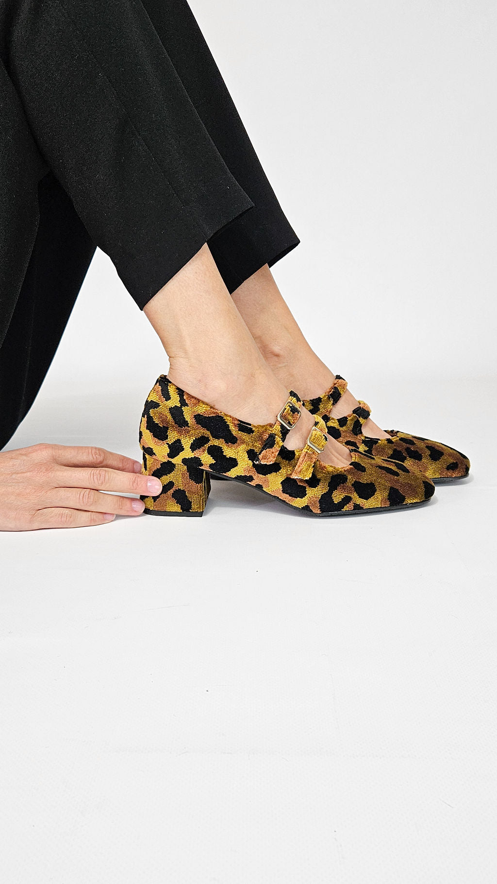 Momoc Bardot leopard velvet midi heels worn side view black trousers standing Mary Jane Spain | Momoc Shoes