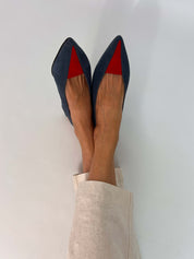 Momoc Luna backless sandals pair top view petrol blue red toe pink insole with beige trousers and white background | Momoc Shoes Spain