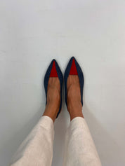 Momoc Luna backless sandals pair top view petrol blue red toe pink insole with beige trousers and white background | Momoc Shoes Spain