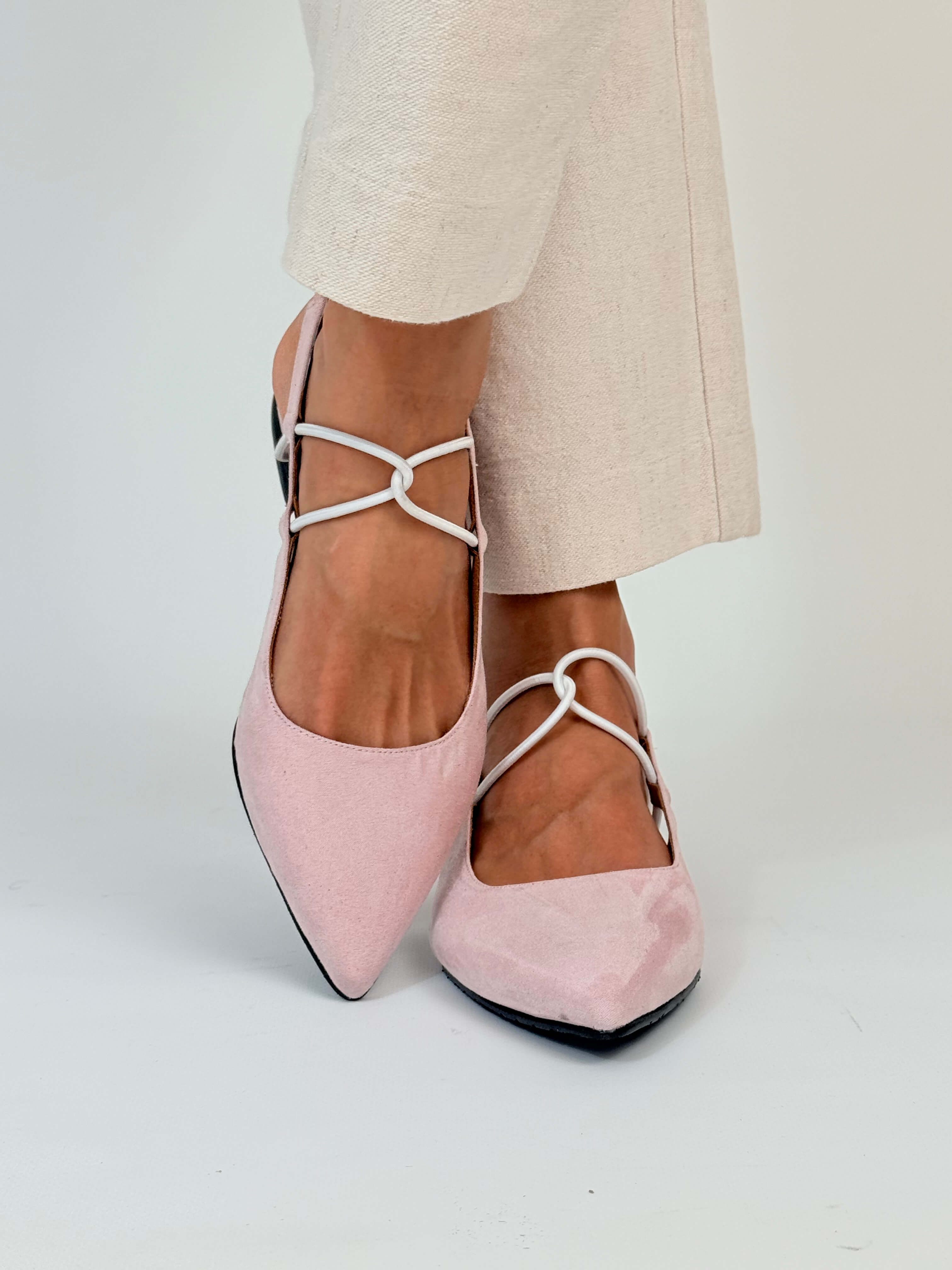 Momoc Menorca pale pink slingback sandal worn close up raised foot cream trousers elegant | Momoc Shoes