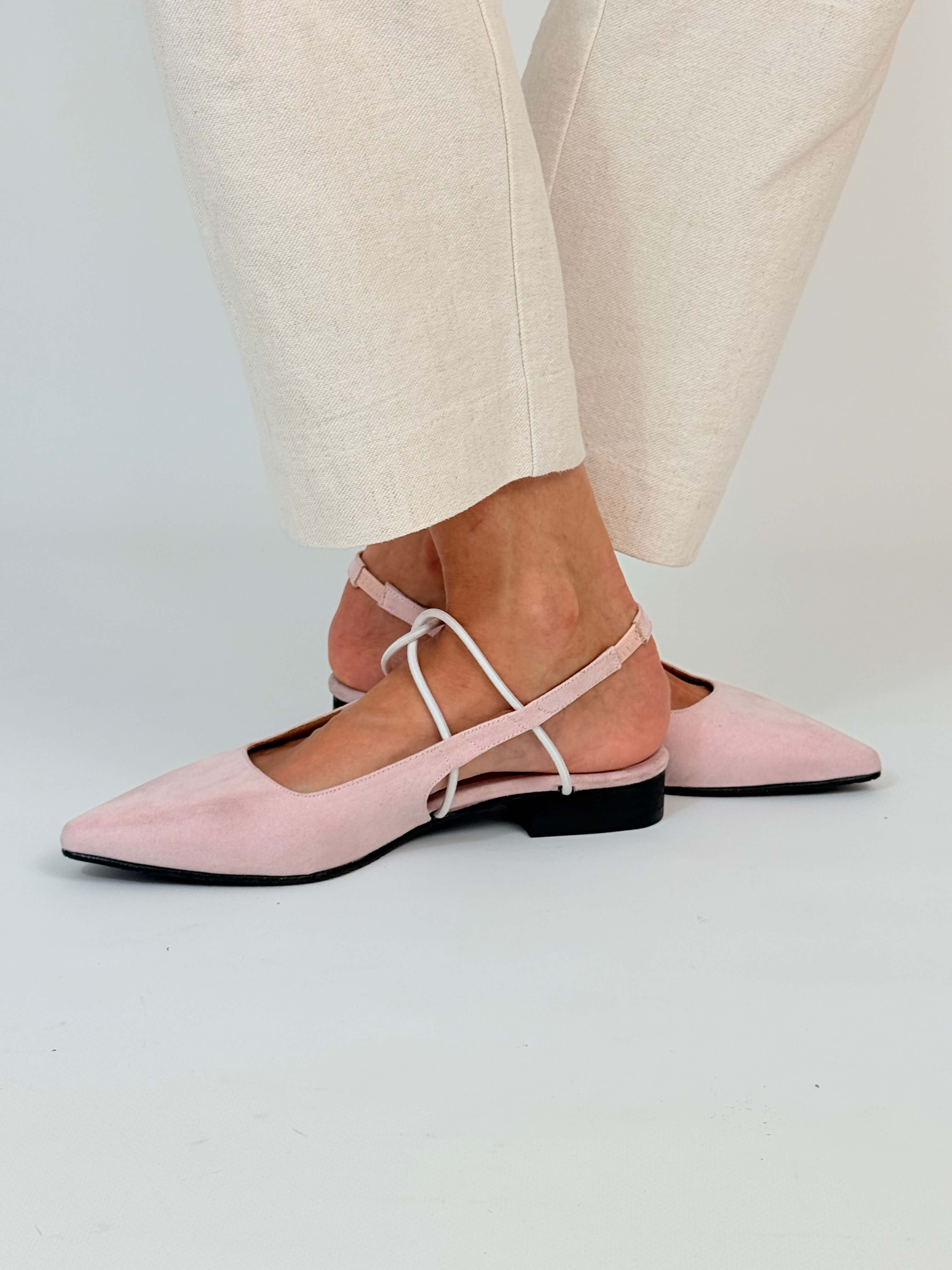 Momoc Menorca pink sandals worn front view cream trousers pointed toe artisan detail Spain | Momoc Shoes Spain