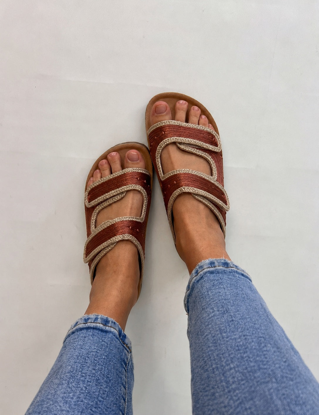 Momoc Biar terracotta sandals worn top view light denim jeans anatomic platform sustainable Spain | Momoc Shoes Spain
