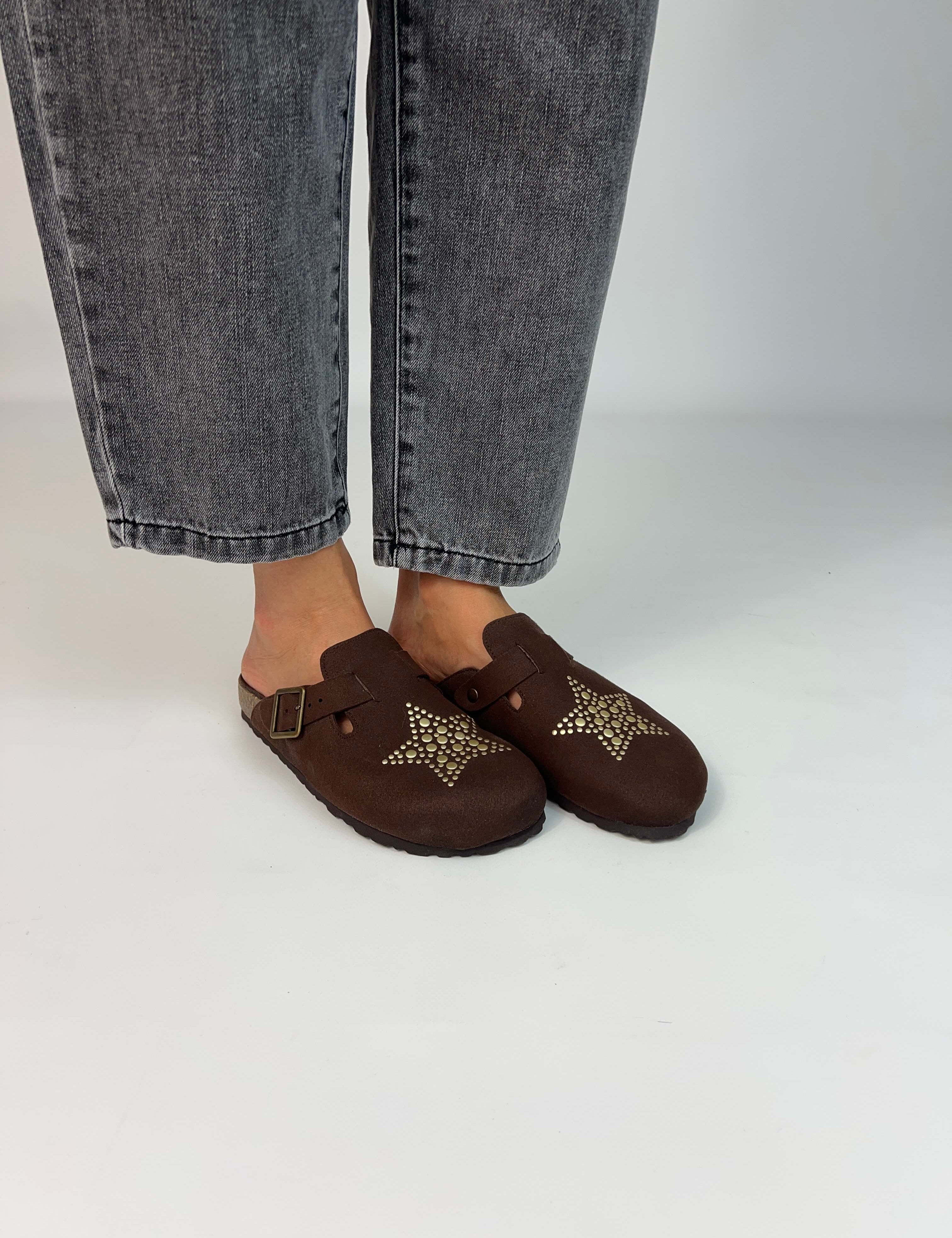 Momoc A Star Chocolate clog worn side view grey jeans gold studded star handmade Spain | Momoc Shoes