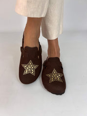 Momoc A Star Chocolate clogs worn cream trousers gold star studs platform clog Spain | Momoc Shoes Spain