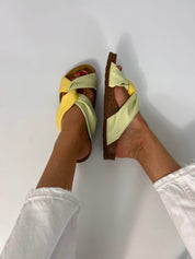 Momoc Calpe yellow green pastel sandals worn side profile white trousers anatomic platform detail | Momoc Shoes Spain