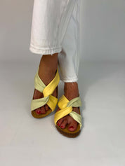 Momoc Calpe butter yellow pistachio knotted sandals worn white linen outfit summer lifestyle full view | Momoc Shoes