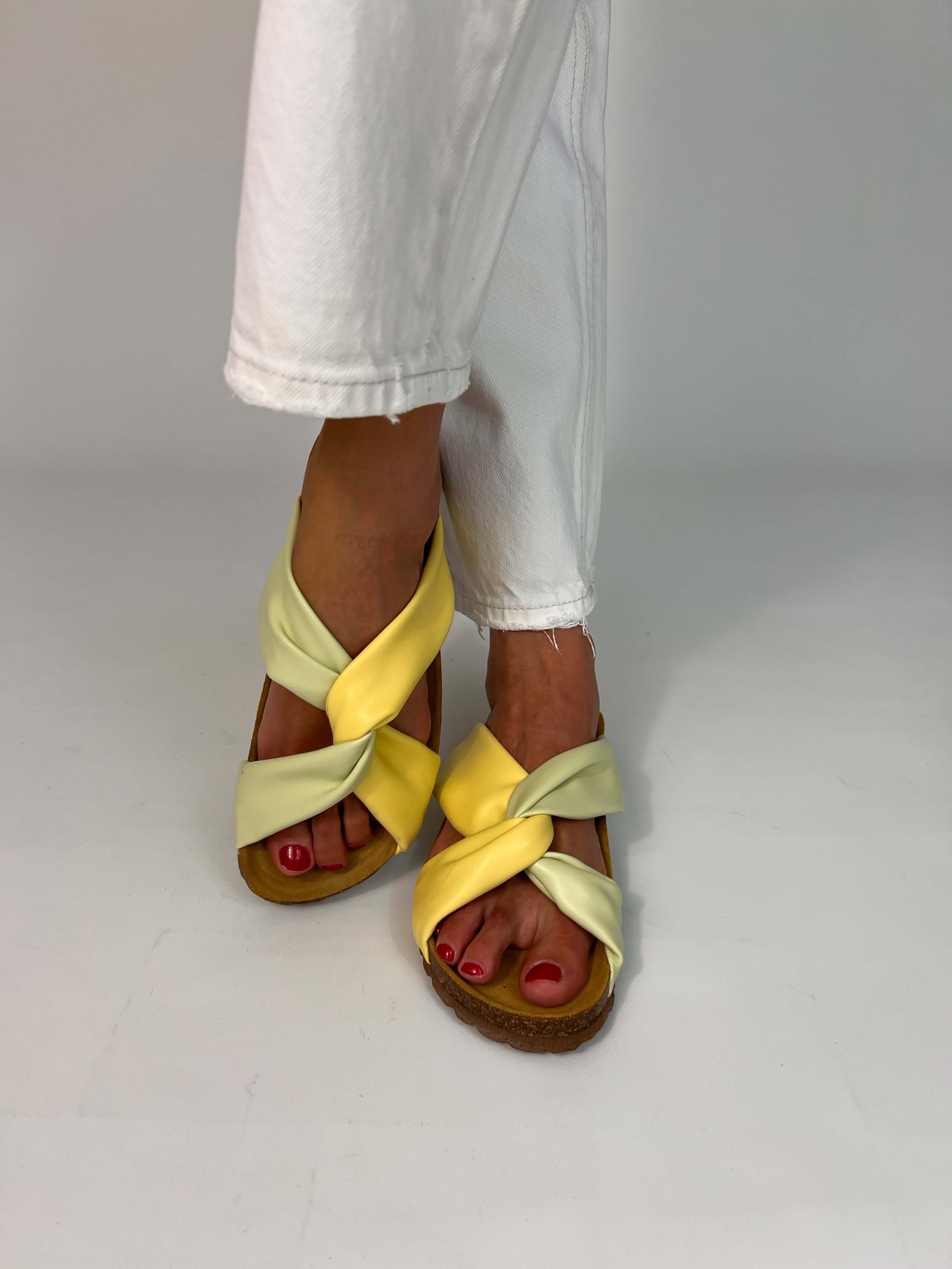Momoc Calpe butter yellow pistachio knotted sandals worn white linen outfit summer lifestyle full view | Momoc Shoes