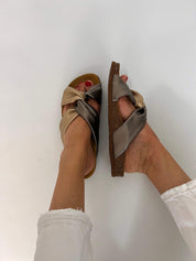 Momoc Calpe bronze champagne sandals worn side profile white trousers anatomic platform detail | Momoc Shoes Spain