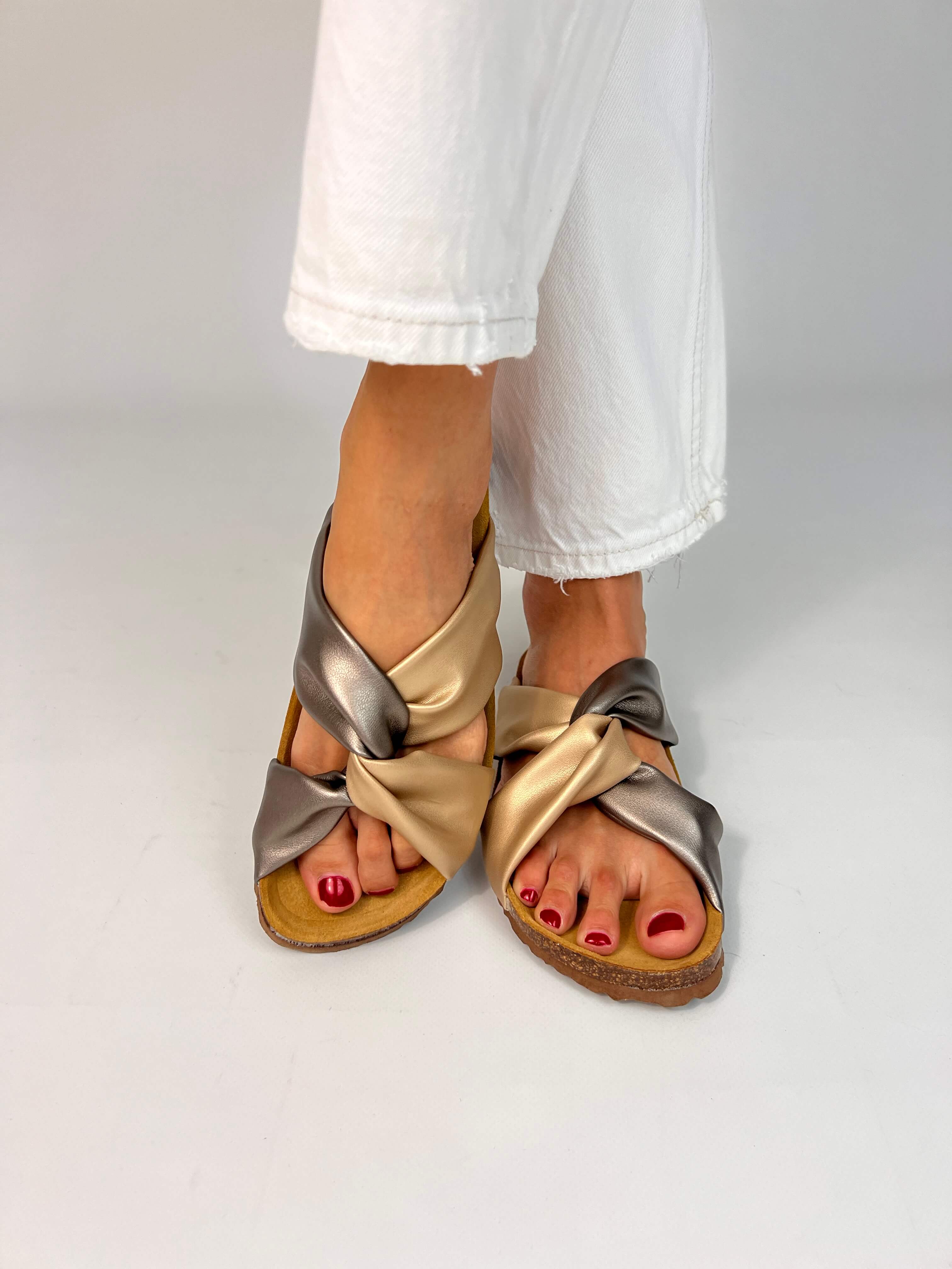 Momoc Calpe bronze gold knotted sandals worn white linen outfit summer evening lifestyle full view | Momoc Shoes