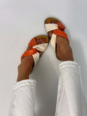 Momoc Calpe orange cream knotted sandals worn top view white jeans both feet vegan Spain | Momoc Shoes Spain