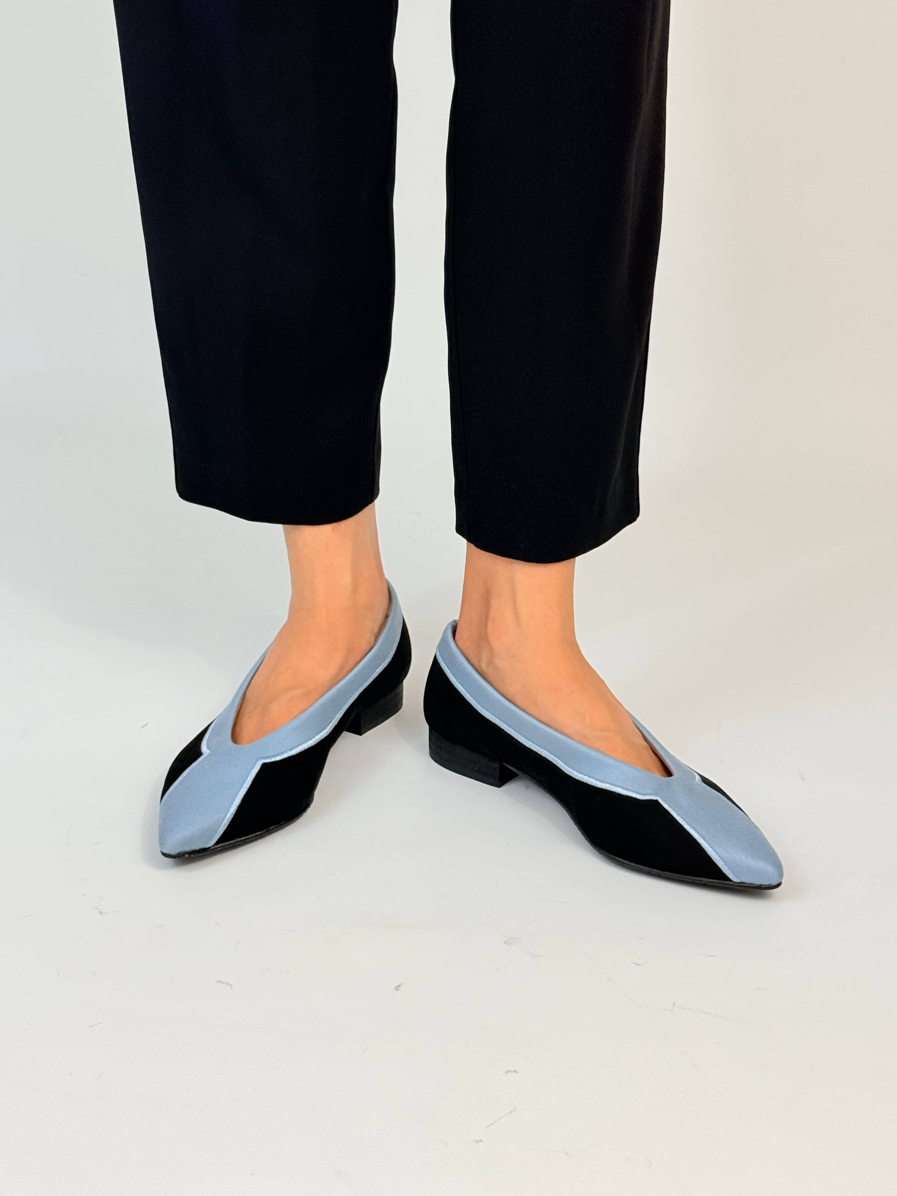 Momoc Coral Reef Blue ballet flats worn front view black trousers sky blue contour detail Spain | Momoc Shoes