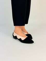 Momoc Sea Breeze ballet flats worn one foot black trousers Leticia Credidio collaboration Spain | Momoc Shoes Spain
