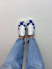 Momoc Patchwork sneakers worn top view first person light denim jeans checkerboard pattern Spain | Momoc Shoes Spain