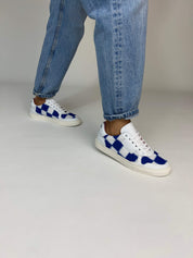 Momoc Patchwork blue cobalt white sneakers worn front view light denim jeans both feet | Momoc Shoes