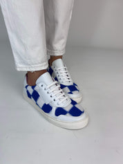 Momoc Patchwork sneakers worn side view white trousers cobalt blue mesh detail Spain | Momoc Shoes