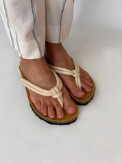 Momoc Javea natural rope sandal worn side view striped white trousers cork sole sustainable | Momoc Shoes Spain