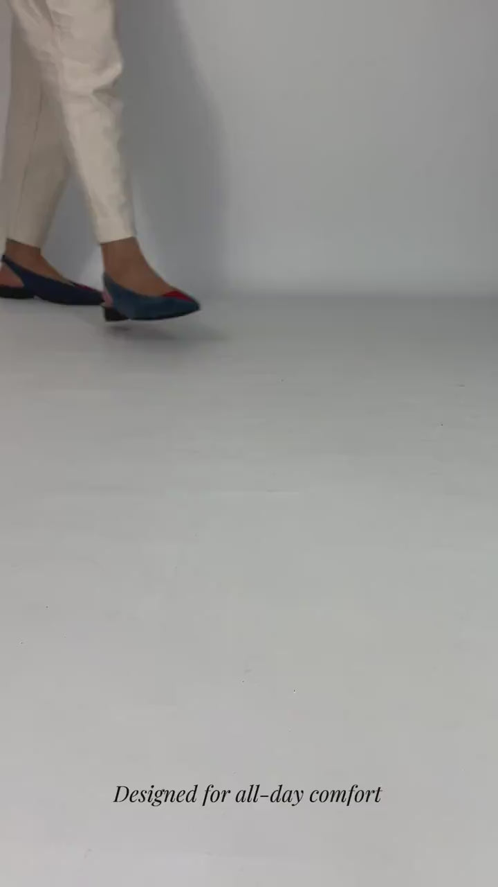 Momoc Luna backless sandals walking video petrol blue red toe pink insole with white trousers and white background | Momoc Shoes Spain